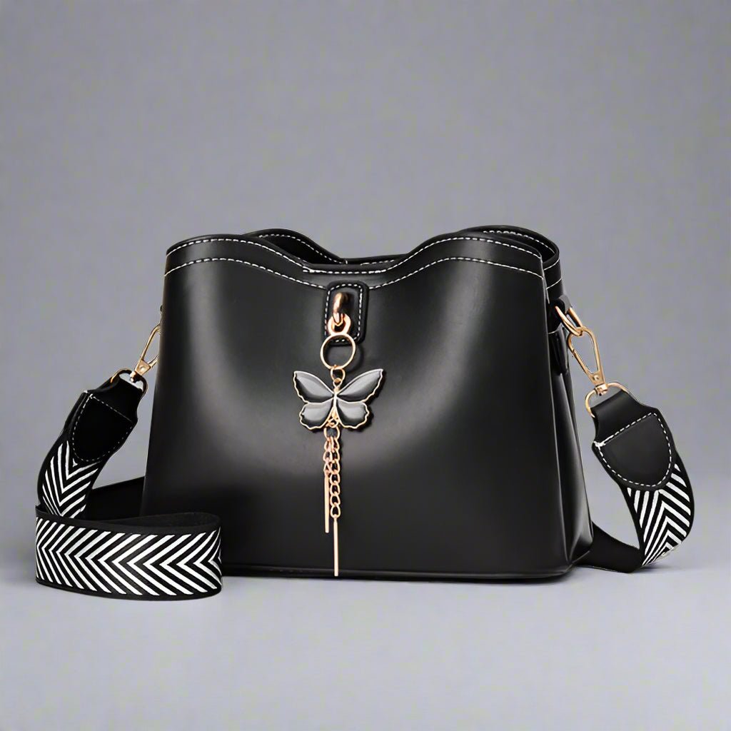 Butterfly Charm Crossbody Bag β Stylish & Trendy Shoulder Bag | - TheComfortshop.co.ukHand Bag10721718957901TheComfortshop.co.ukTheComfortshop.co.uk9604 GESSY CROSSBODY BAG BLACKBlackButterfly Charm Crossbody Bag β Stylish & Trendy Shoulder Bag |